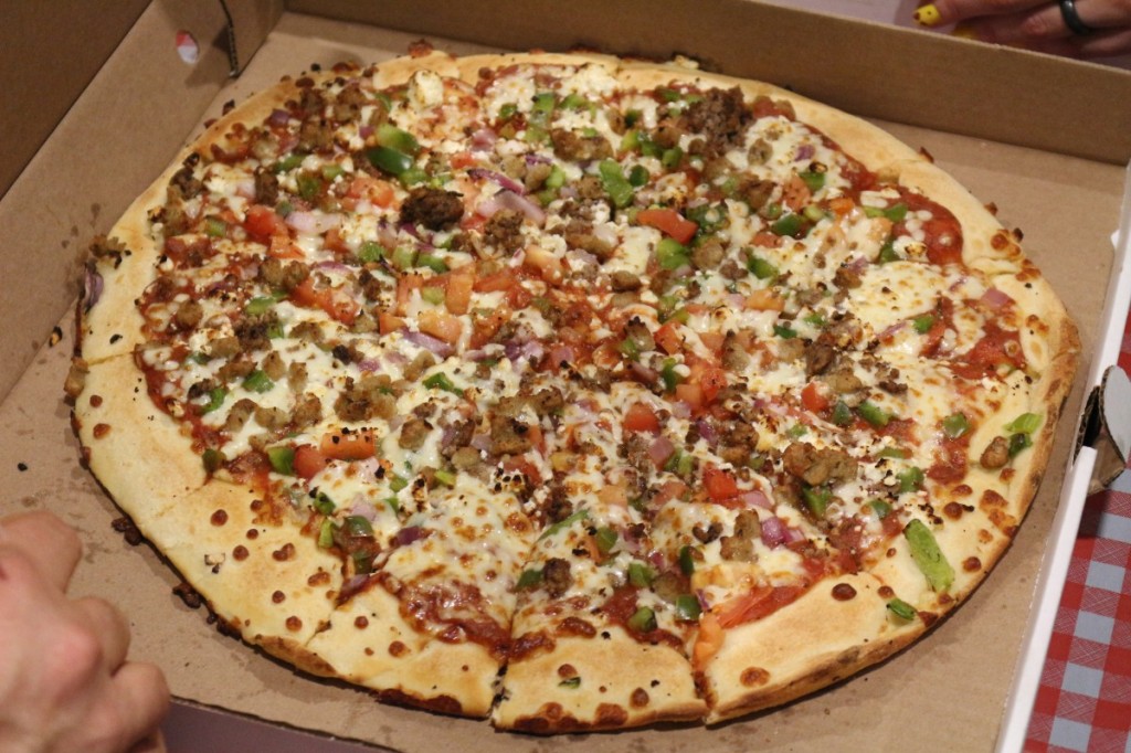 Freeman's House Specialty: Italian sausage, ground beef, feta cheese, tomato, green pepper, red onion